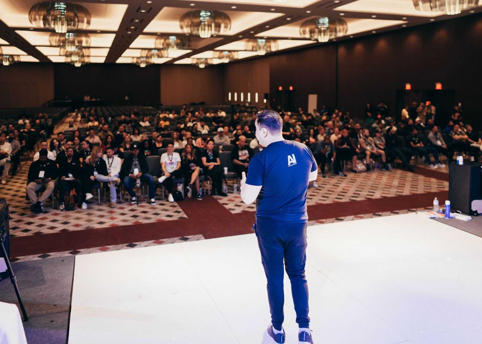 Paul Rosalino on stage delivering a keynote